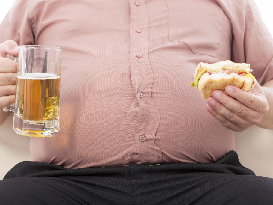 Obese man with alcohol