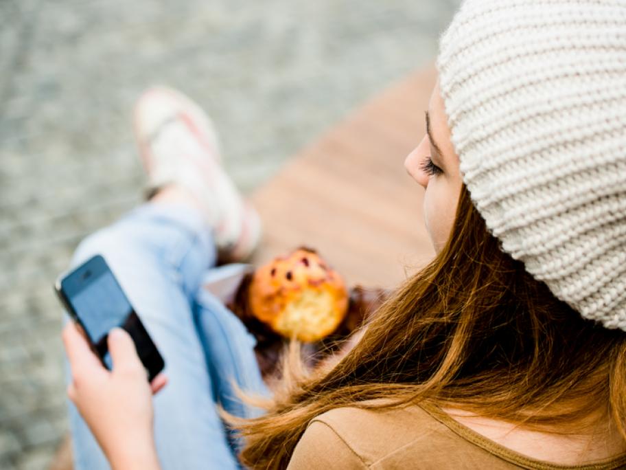 teenager with a muffin