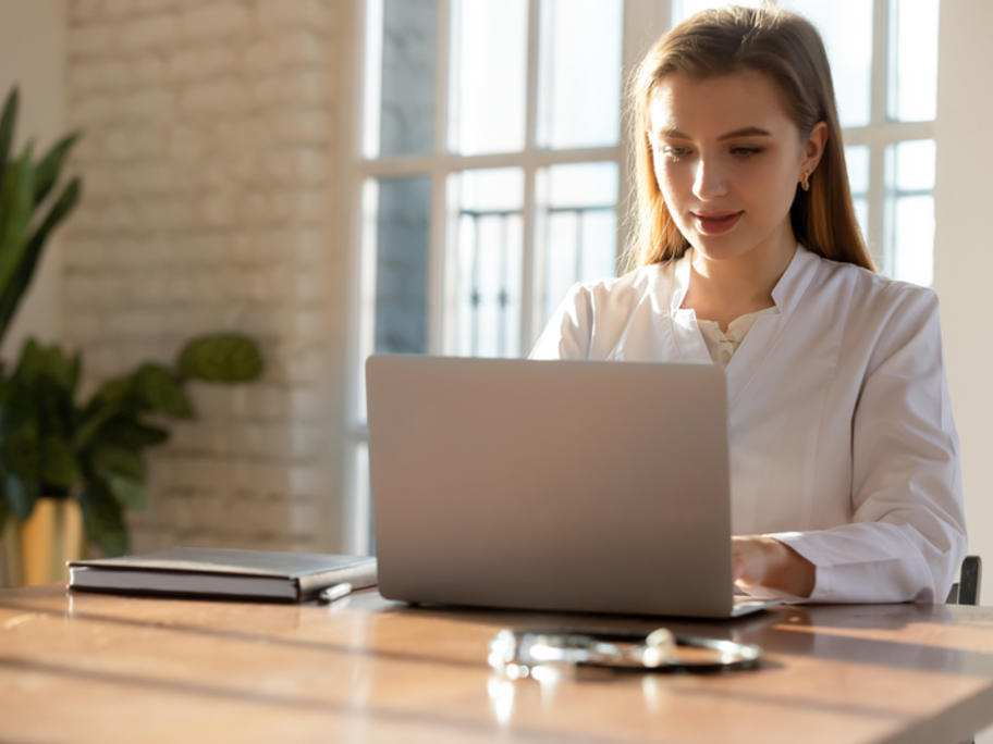 GP working at laptop
