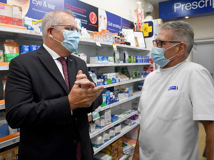 Prime Minister Scott Morrison visits a pharmacy in Lugarno, south of Sydney, Tuesday, 5 April 2022