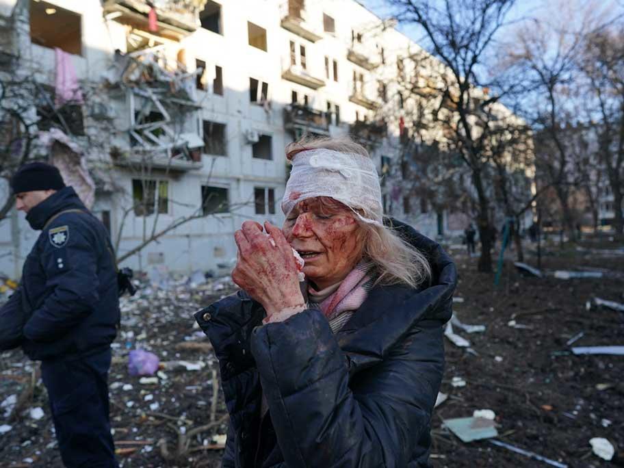 Woman covered in blood in Ukraine