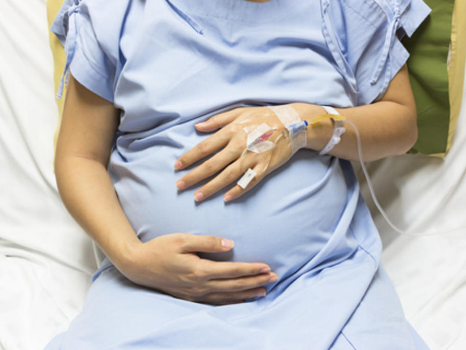 Pregnant woman on a drip