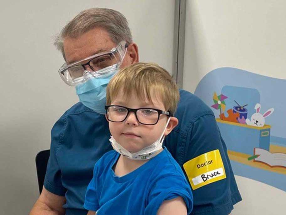 Professor Bruce Pussell with his grandson