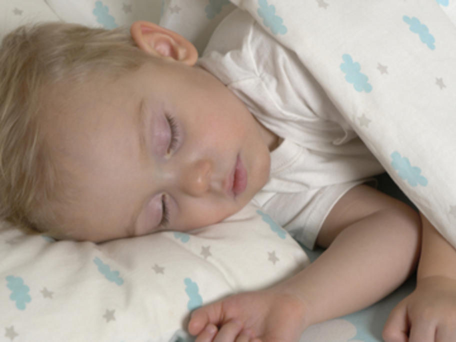 little boy aged 2-3 years asleep