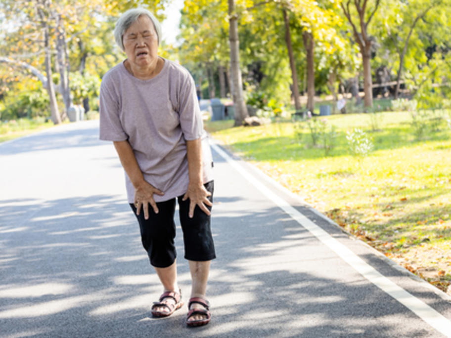 Breathless senior Asian woman