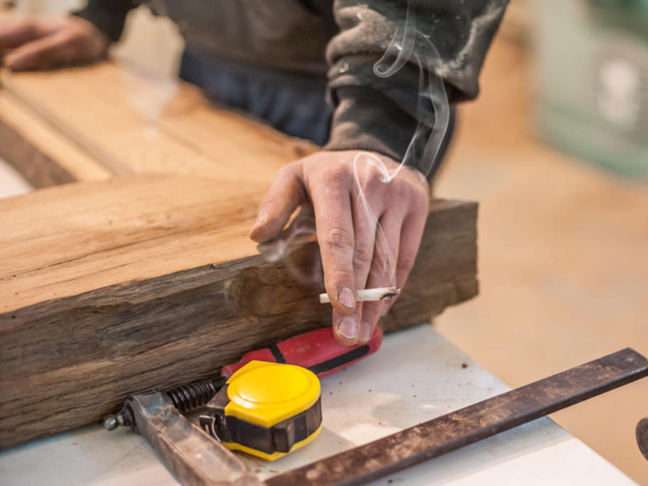 carpenter smoking while he works