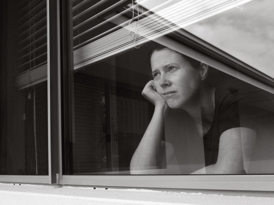 sad looking woman in lockdown