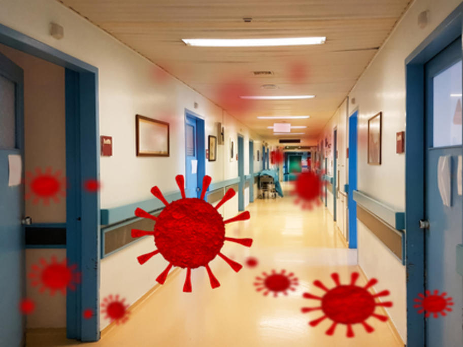 hospital corridor with Coronavirus particle images superimposed