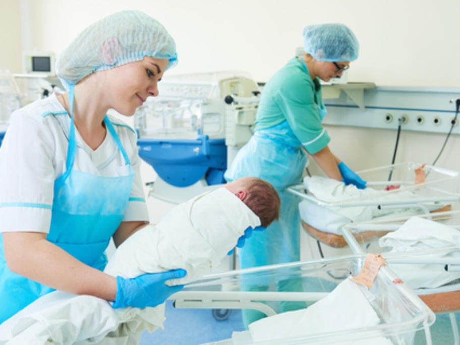 nurses and babies in neonatal unit