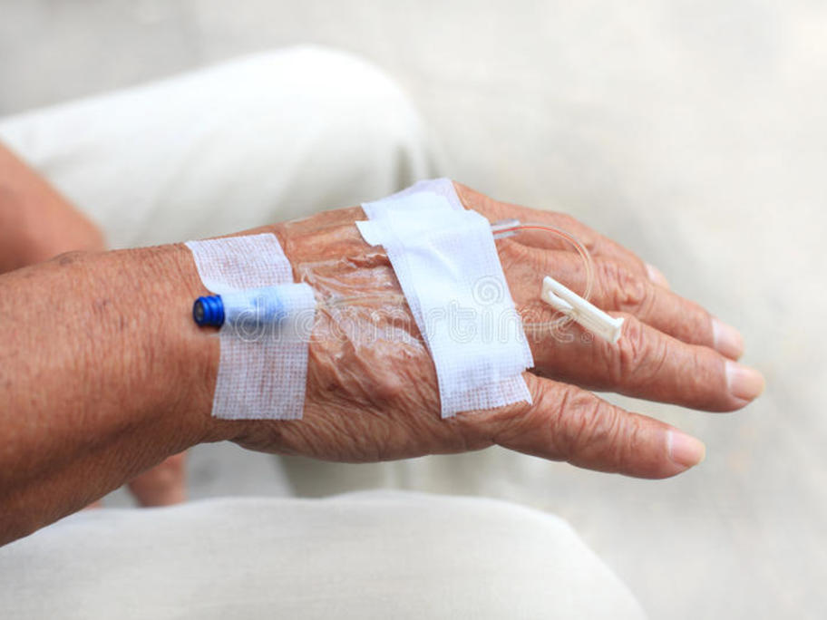 senior man's hand with vein canulated