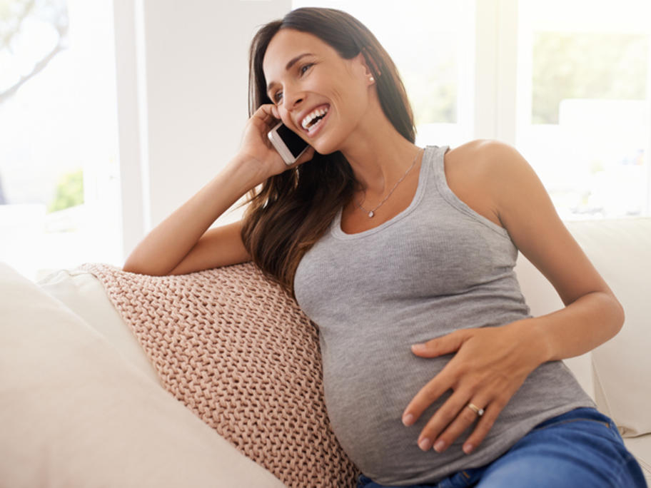 pregnant woman talking on the phone