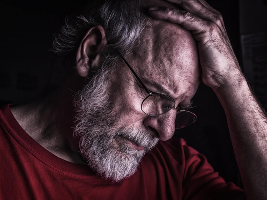 Senior man looking distressed