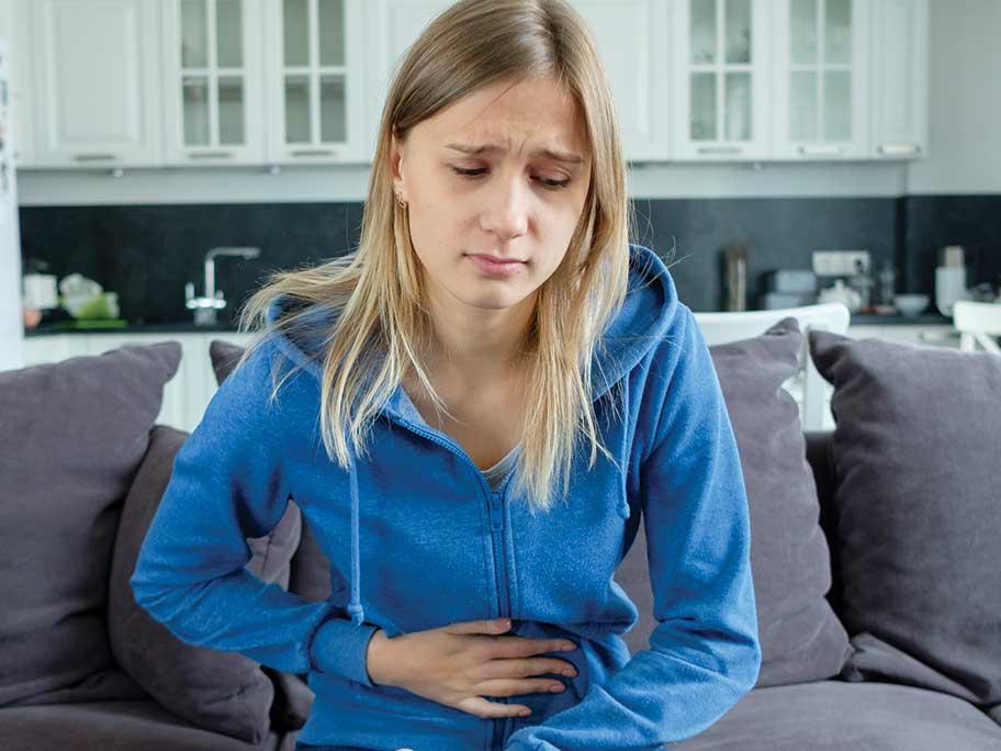 teen with stomach ache