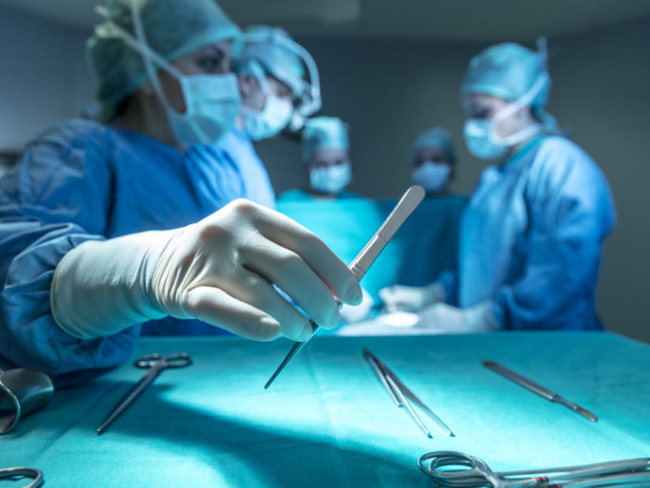 Surgeons operating