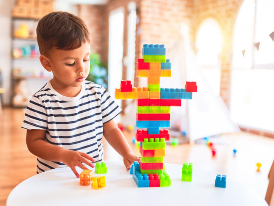 toddler playing with blocks