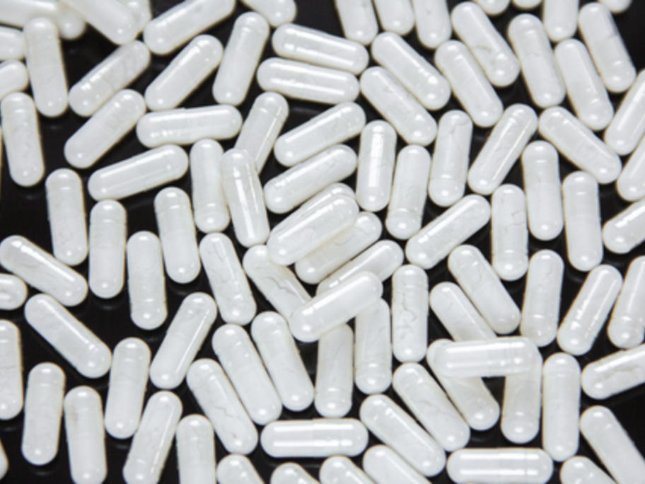 white capsules - enzyme tablets