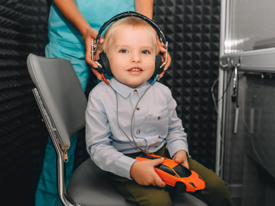 young boy hearing test