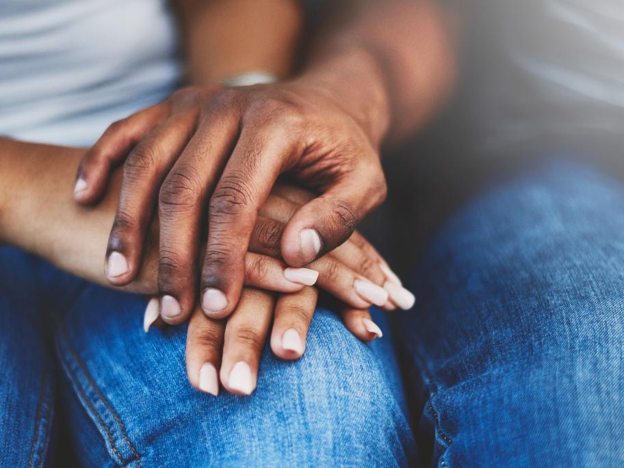 Couple holding hands