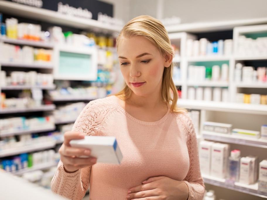 pregnant woman in pharmacy