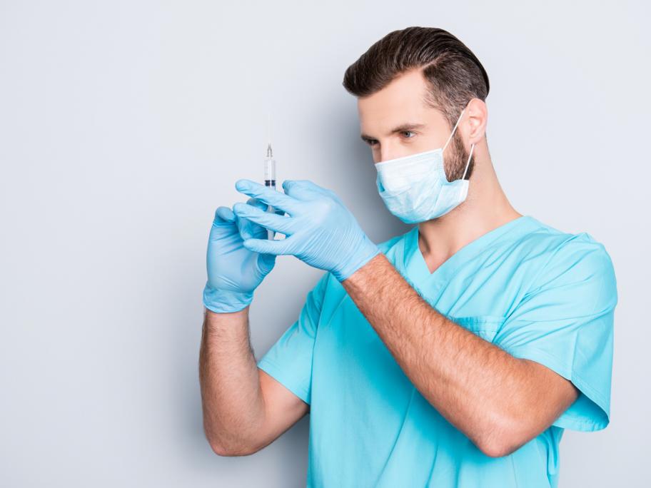 Anaesthetist with injection