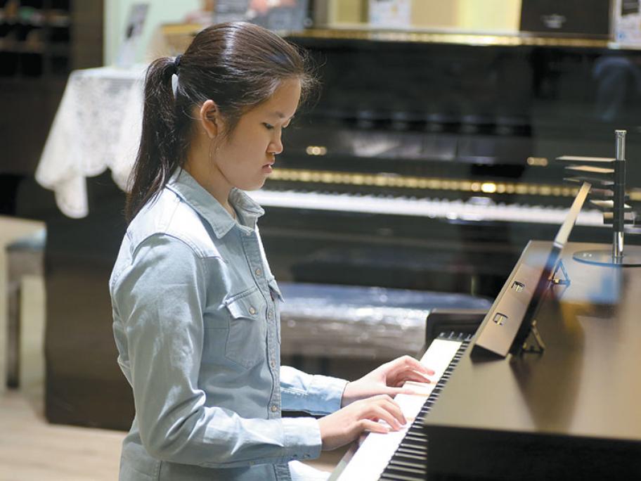 Girl playing piano