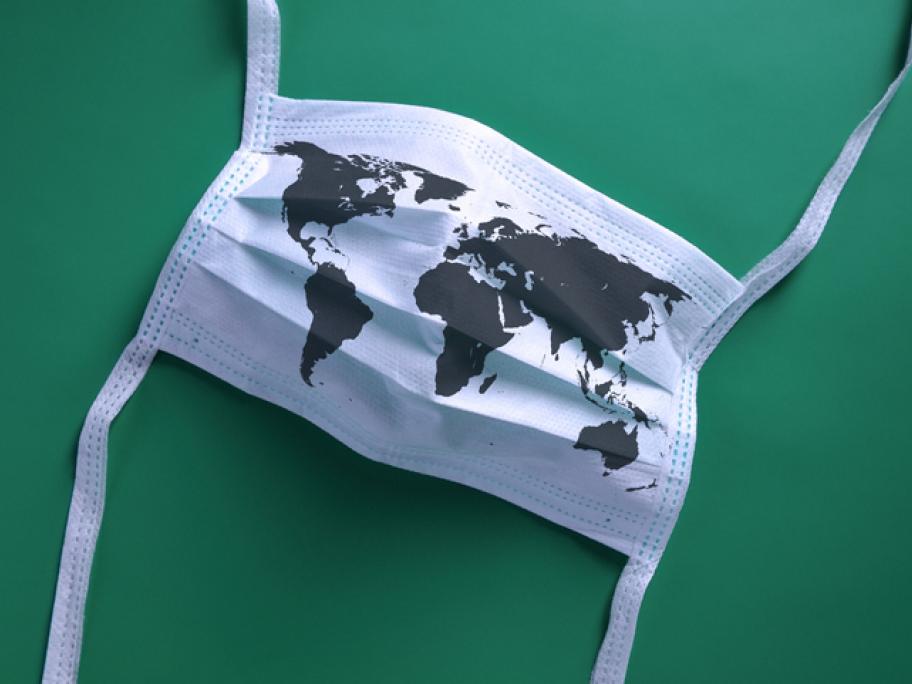 surgical mask with map of the world on it - representing global pandemic