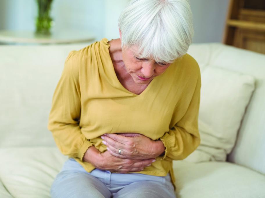 Senior woman stomach ache
