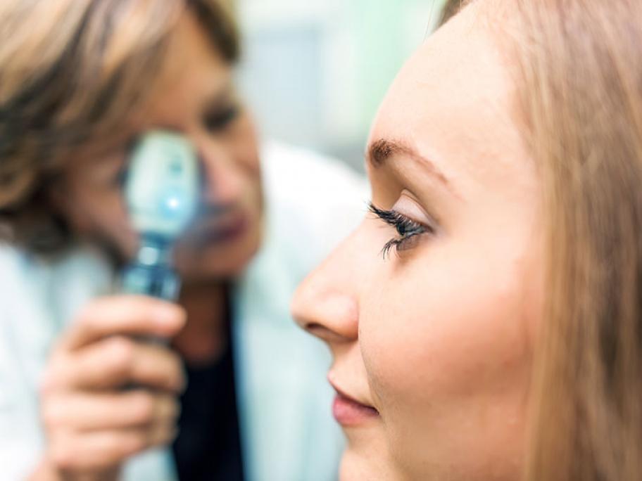 Young woman at optometrist