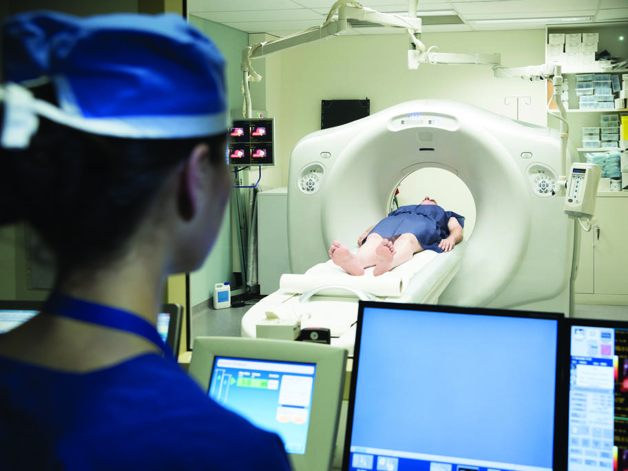 Young person having CT scan