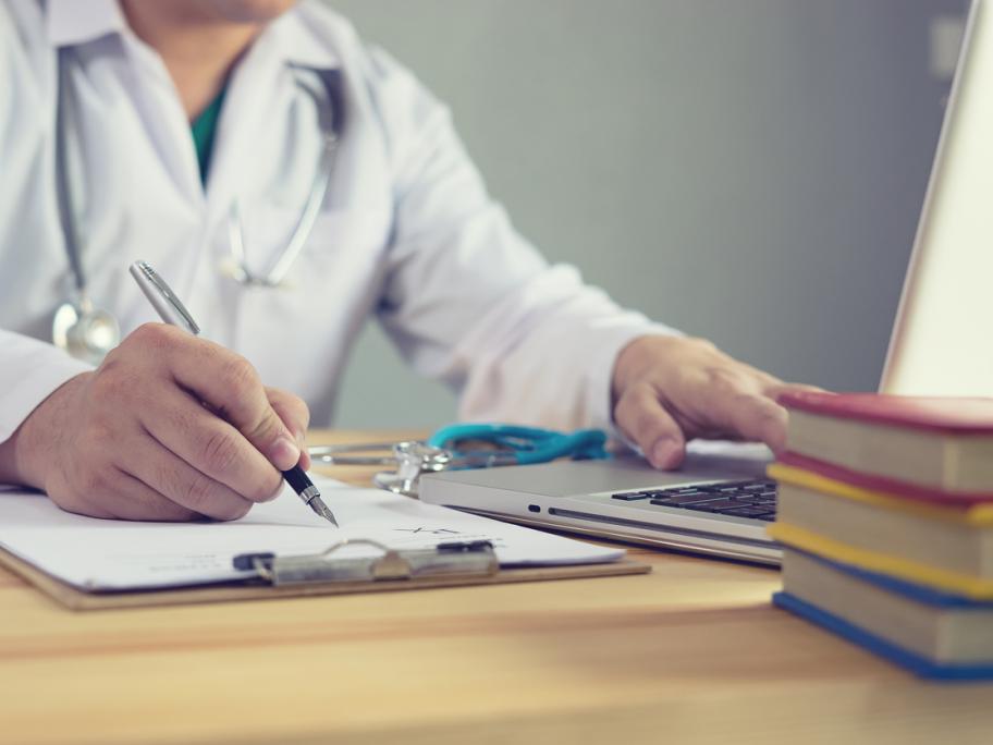 doctor writing script