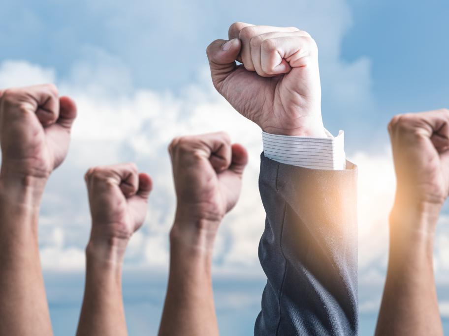 fists in air