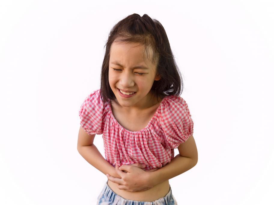 girl with sore stomach