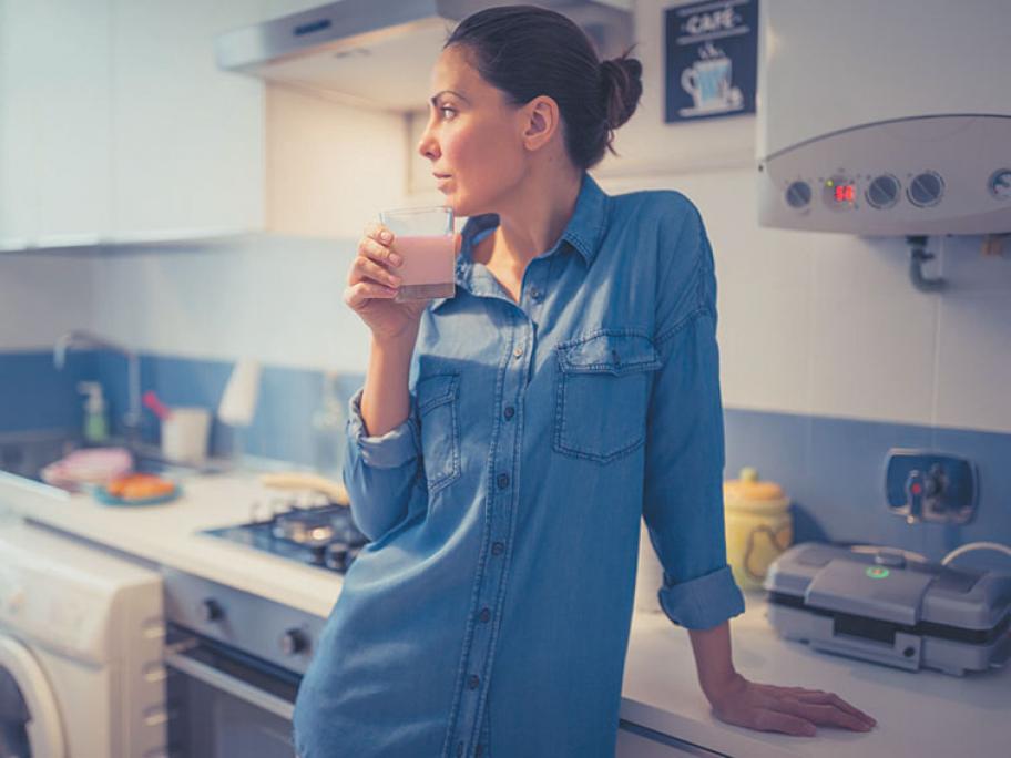 woman drinking milk supplement sustagen
