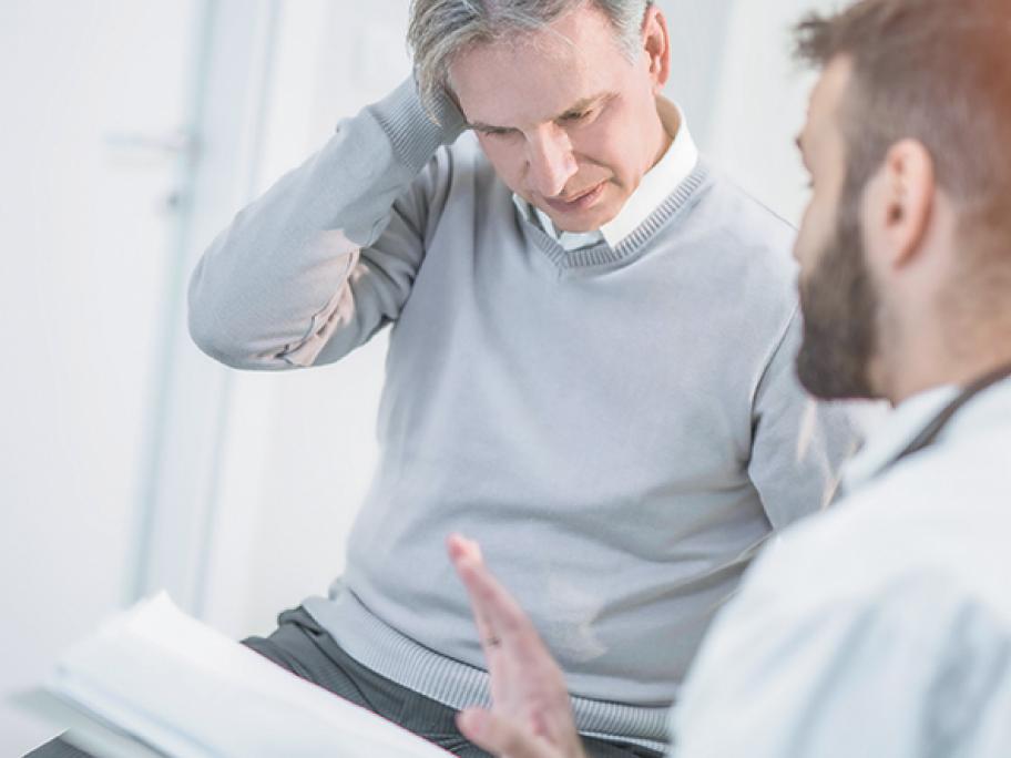 worried man-doctor consult