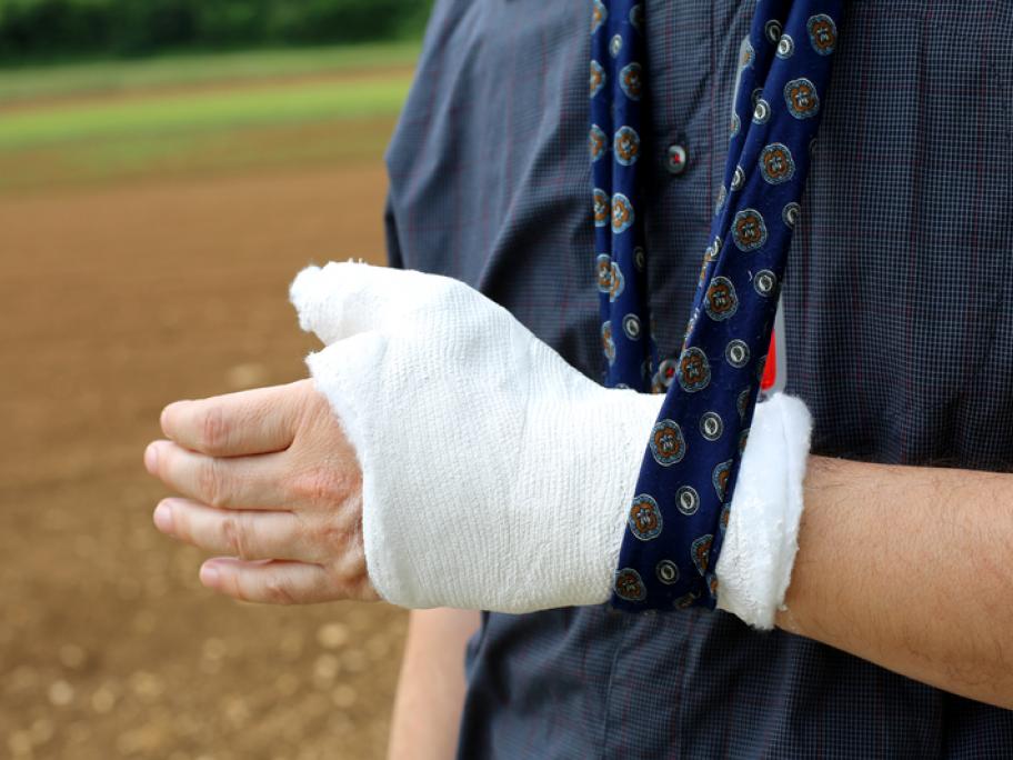 Man with hand in plaster