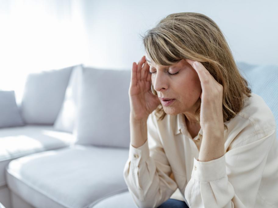 Woman in her 40s with headache