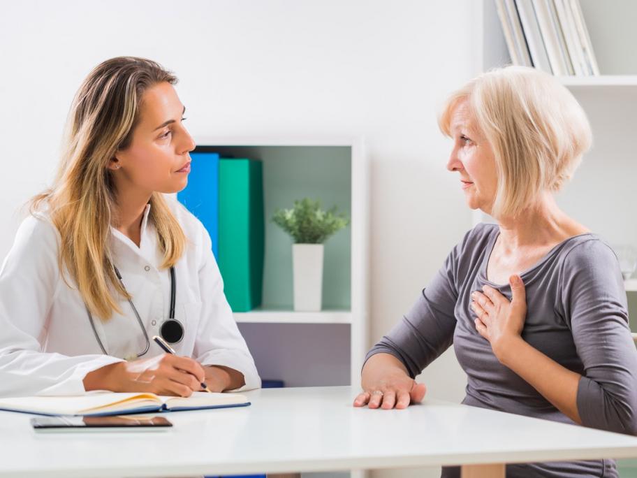 Woman with heart pain