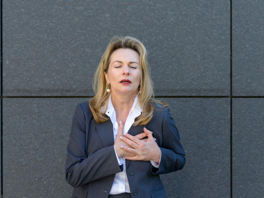 Woman having a heart attack