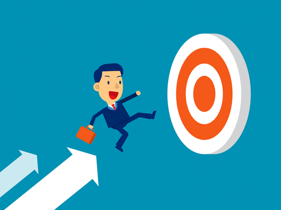 businessman hitting target