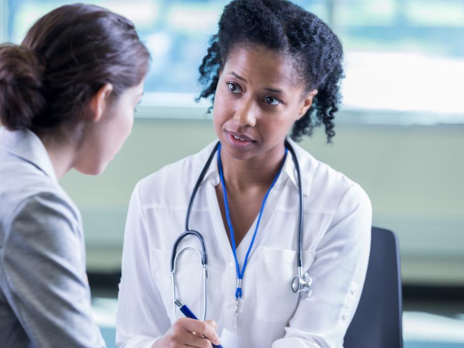 Doctor listening to patient