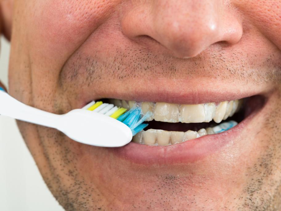 Man brushing his teeth