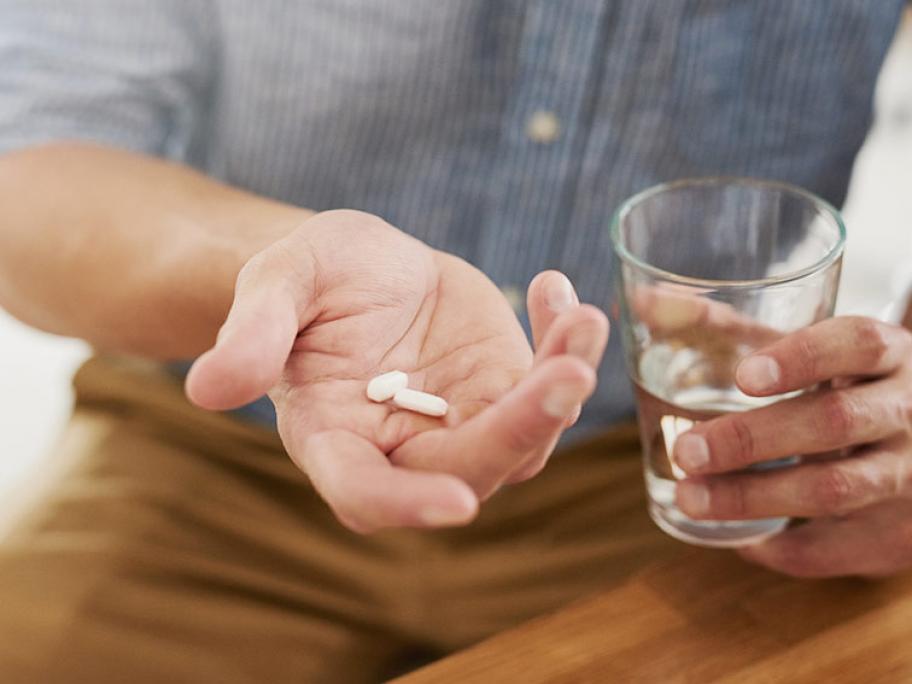 man with pills