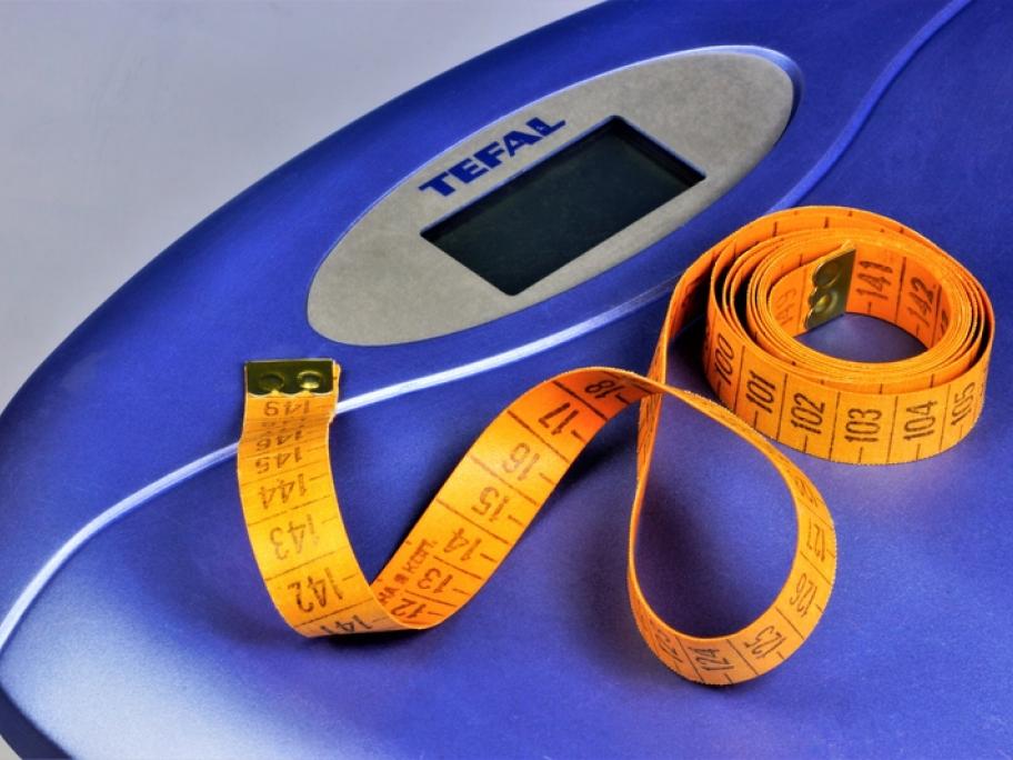 scales and tape measure signifying weight loss