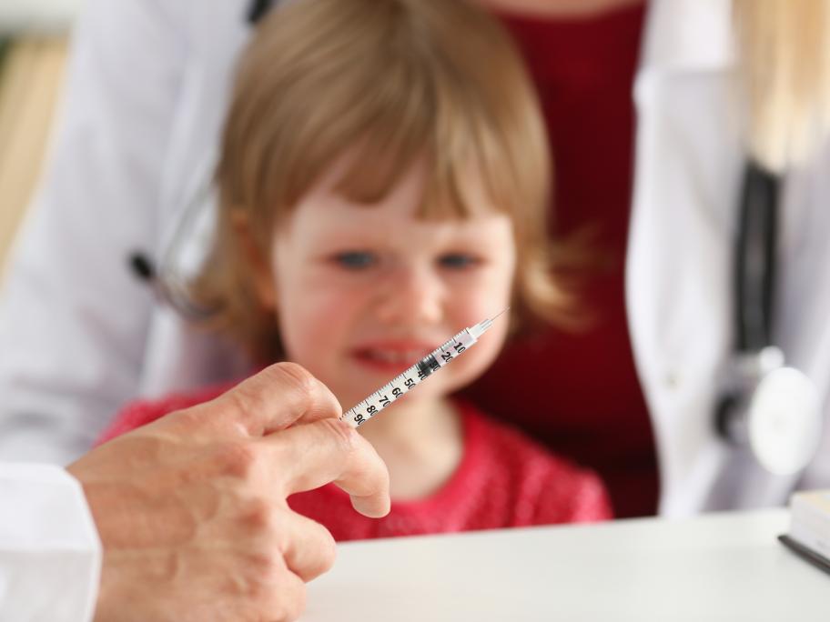child getting injection