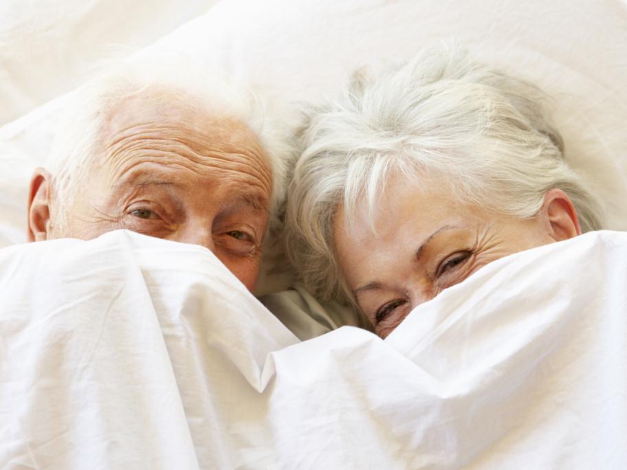 Seniors in bed
