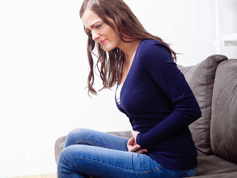Woman with stomach pain