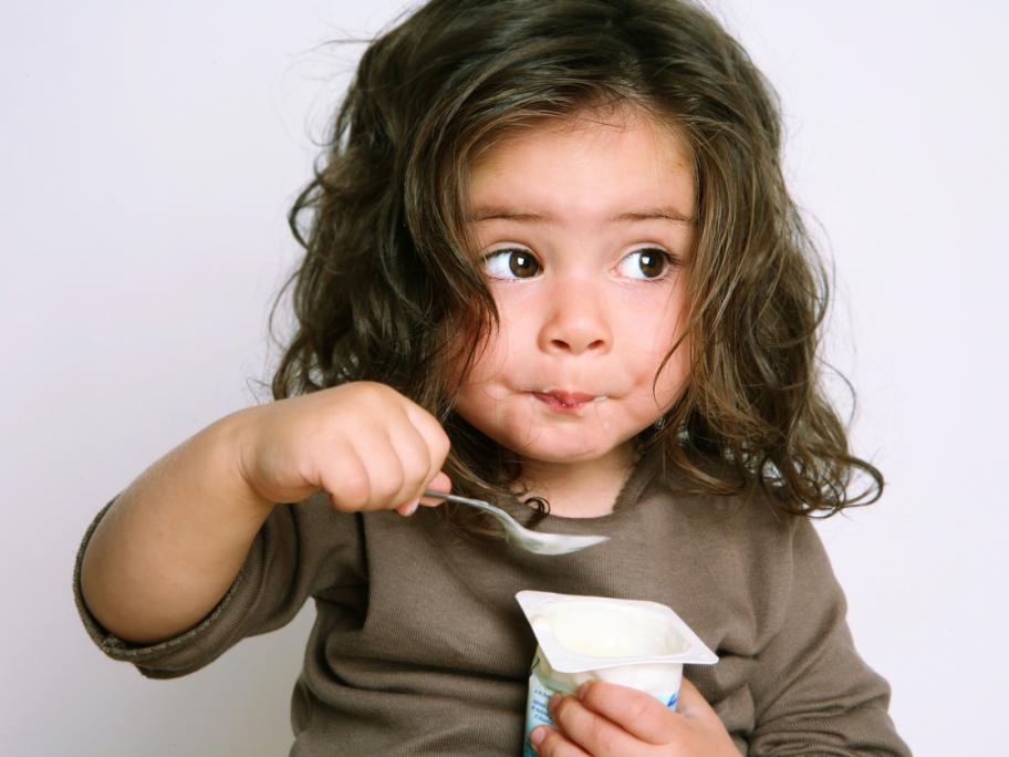 Child eating yoghurt