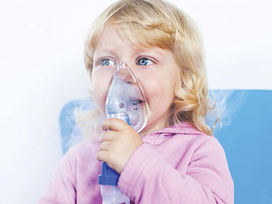 child with oxygen mask and asthma