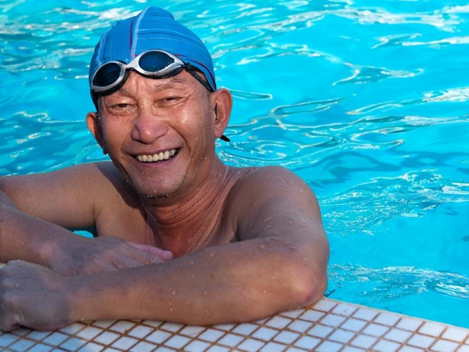 older man swimming