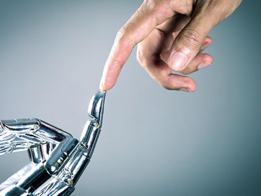 Bionic hand touching human hand